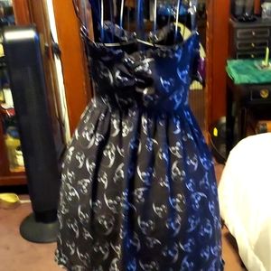 Sourpuss lust for skulls dolly dress